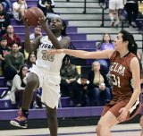 Lemoore's Amaya Sanchez scores Thursday night against Selma in the Tigers home basketball opener.